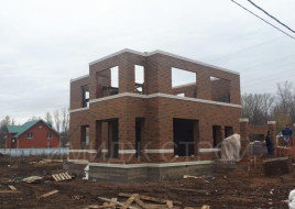 Коричневый дом 182 кв.м. в стиле Райт плюс встроенный гараж на одну машину